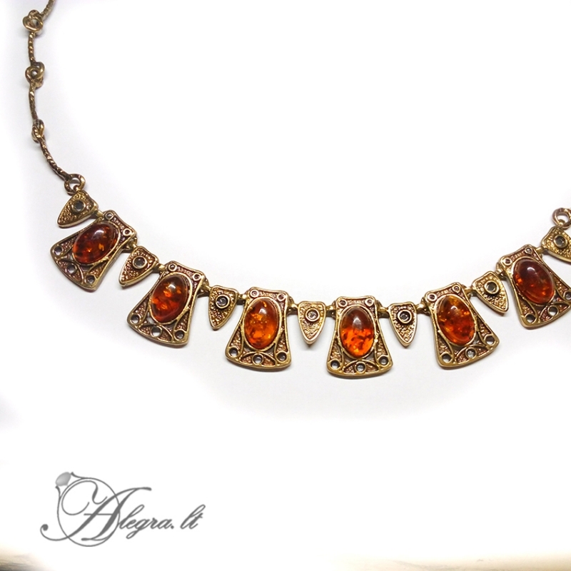 1923 Brass necklace with burned amber