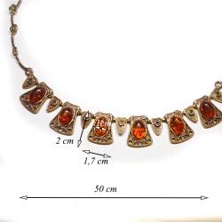 1923 Brass necklace with burned amber